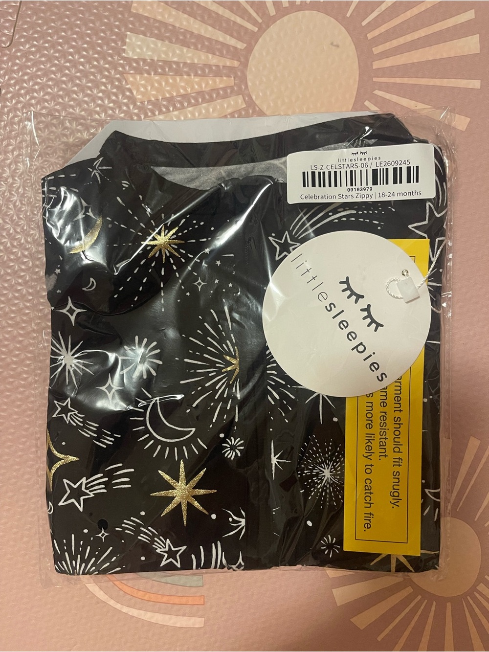 Little Sleepies Black Zippy with Gold & White Starburst Print